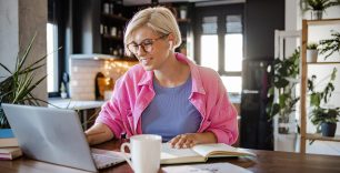 Young woman working in her home office.